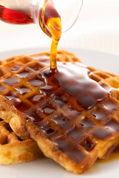istock Sprinkle plenty of maple syrup on the waffles 1306420267