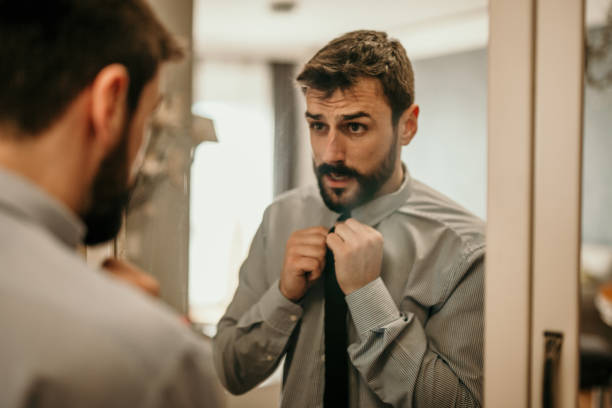 istock Businessman getting ready for a meeting 1306424169