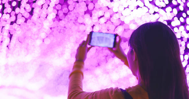istock Traveler takes picture by mobile 1306425173