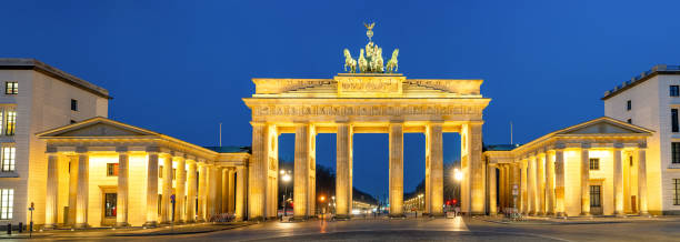 istock Panorama of the famous Brandenburg Gate 1306429599