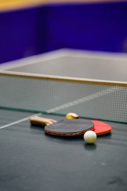 istock a racket and ball placed on a ping-pong table 1306430455