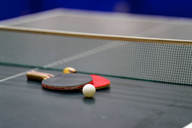 istock a racket and ball placed on a ping-pong table 1306430529