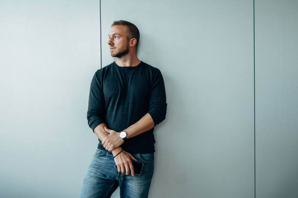 istock Thoughtful male professional looking away 1306437897