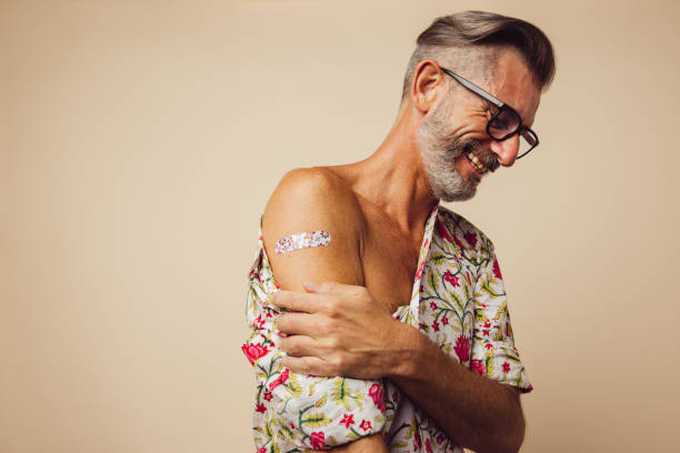 istock Mature man feeling relaxed after getting vaccine 1306438102