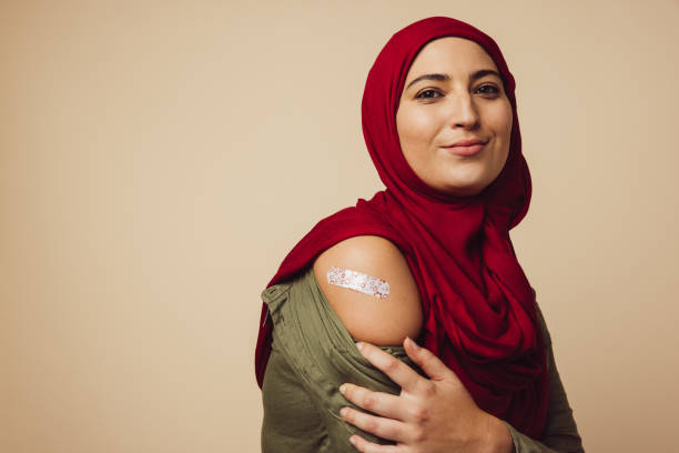istock Muslim woman after getting vaccine 1306438846