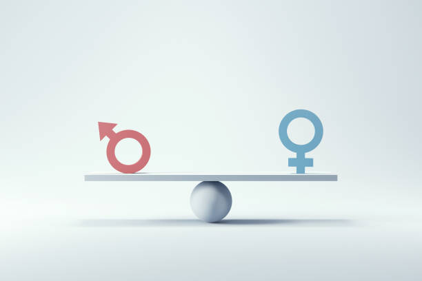 concetto di uguaglianza di genere. simbolo maschile e femminile sulle squame con equilibrio su sfondo blu. - sexual issues immagine foto e immagini stock