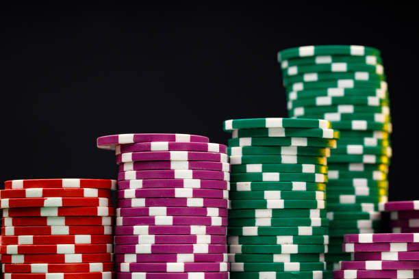 istock Stacks of playing chips on casino table 1306441577