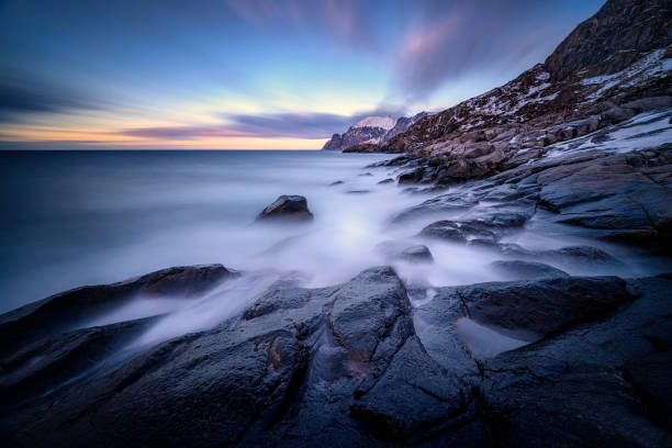 istock Gulf, bay with a huge surf in Mefjord in sunset 1306446643