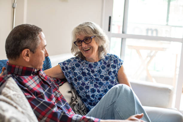 istock Senior couple relaxing at home 1306447090
