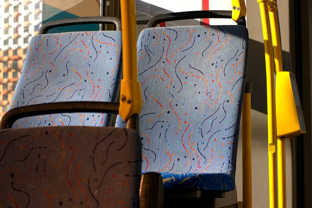 blue passenger seats in a city bus