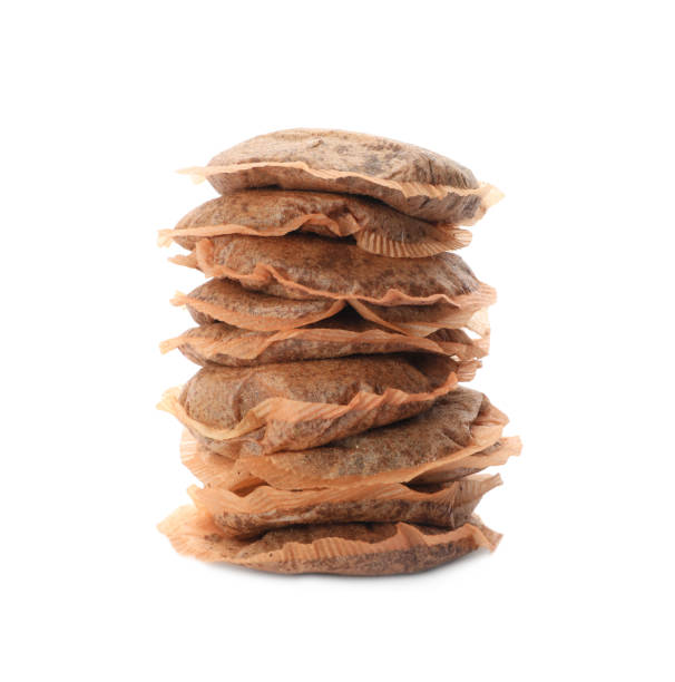 istock Many used tea bags on white background 1306452414