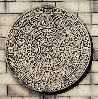 Mexico City, Mexico - Fabruary 08, 2021: Tzolk’in, stone decorative wall decoration, stone panel in the form of the traditional round calendar of the Maya Indians. A sample of the extinct ancient culture and science of the tribes of North America