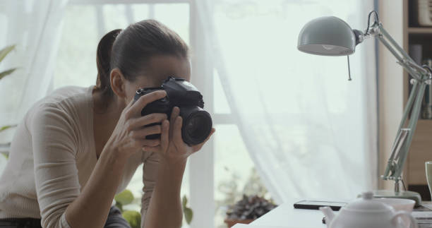 istock Professional photographer working from home 1306453811
