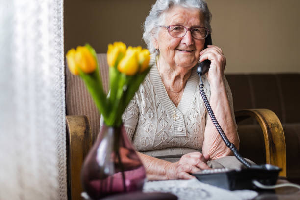 istock Grandma resting and talking on the phone 1306456330