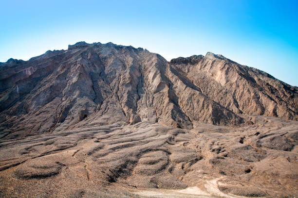 Environmental impact, soil erosion from mountain that have been destroyed by quarrying.