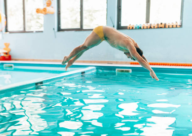 istock man diving in the swimming pool 1306456524