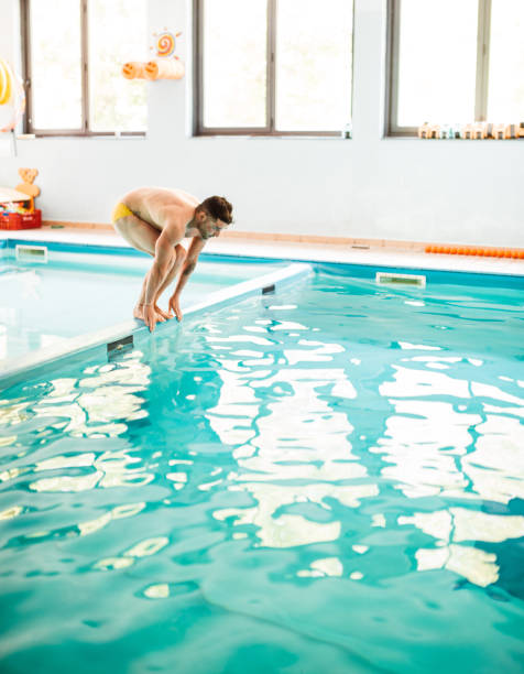 istock man diving in the swimming pool 1306456728