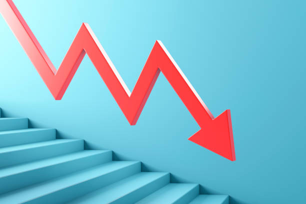 istock Red arrow moves down the stairs 1306457157