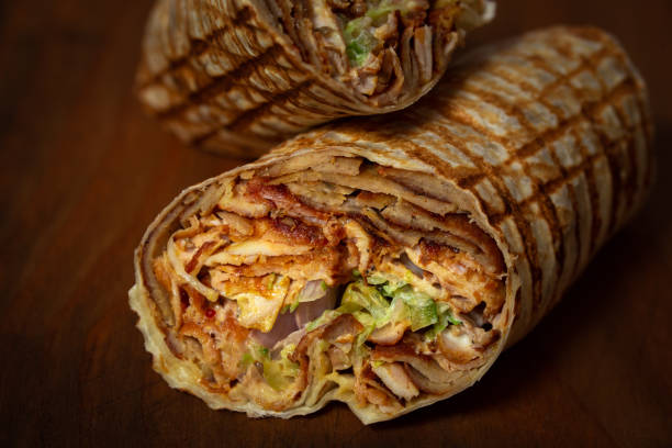all'interno di un durum kebab - portion turkey sandwich close up foto e immagini stock