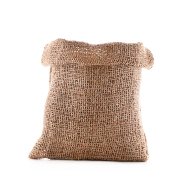 istock Open burlap bag isolated on white. Organic material 1306461439