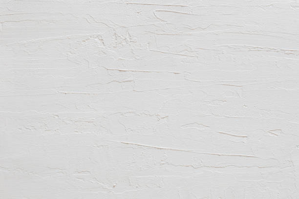 white stucco wall texture view of a wall with trowel coated with white paint stucco photos stock pictures, royalty-free photos & images