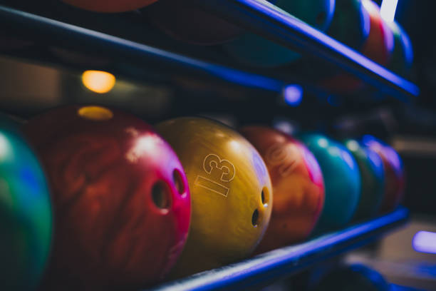 Bowling balls. Bowling alley. Focus is on background. ten pin bowling stock pictures, royalty-free photos & images