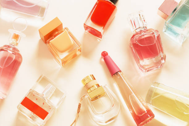istock group of perfume bottles on light background 1306464180