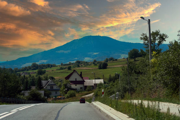 road in the mountains. Mountain sunset landscape