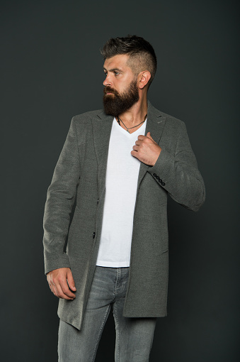 Menswear. Hipster wear comfy outfit. Caucasian man demonstrate fashionable menswear. Bearded man with moustache and beard unshaven face. Hipster wearing casual outfit. Clothes shop. Menswear trend.