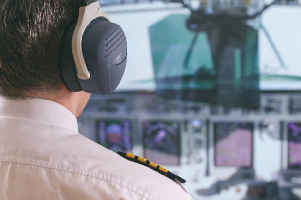 istock Airline pilot wearing uniform with epauletes 1306470737