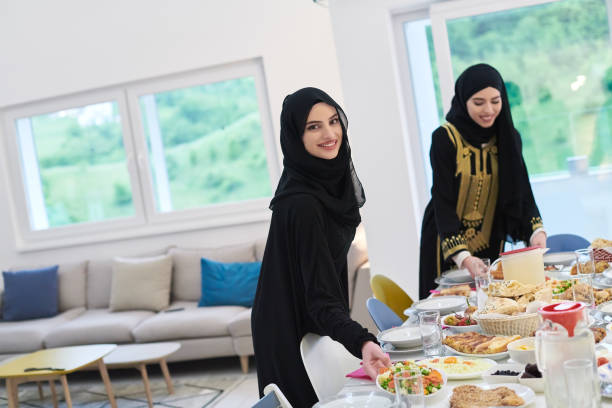 istock Young muslim women preparing food for iftar during Ramadan 1306474391