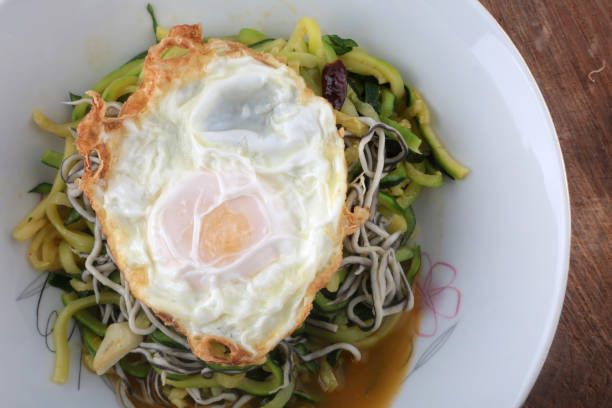istock zucchini angula and fried egg as healthy eating 1306475034