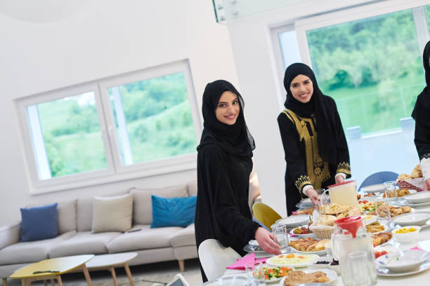 istock Young muslim women preparing food for iftar during Ramadan 1306475581