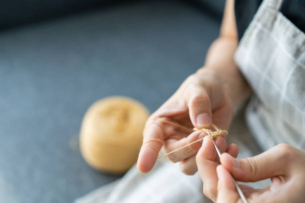istock Unrecognizable Asian woman knitting a crochet 1306477205