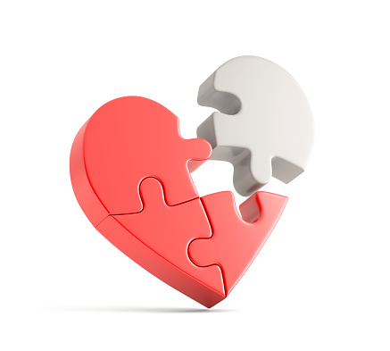 Red heart shaped puzzle on white background. 3d illustration