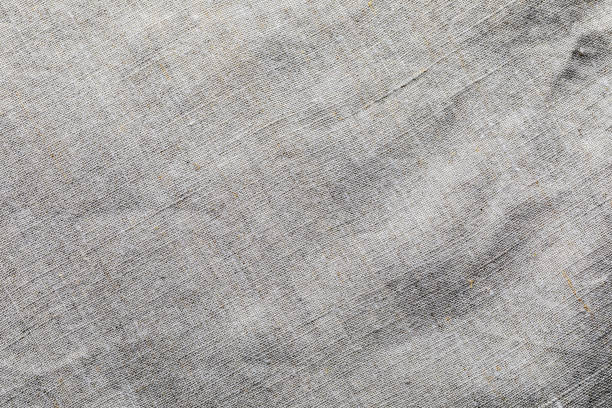 istock Delicate linen fabric texture. Macro close-up. With space for your texts. 1306480217