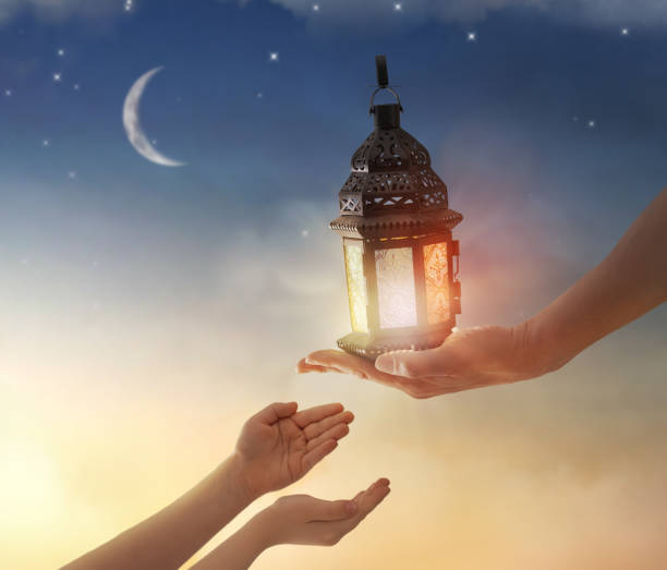 istock Ornamental Arabic lantern with burning candle 1306480686
