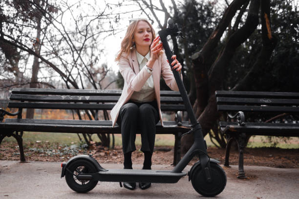 istock A young woman with electric scooter 1306487060