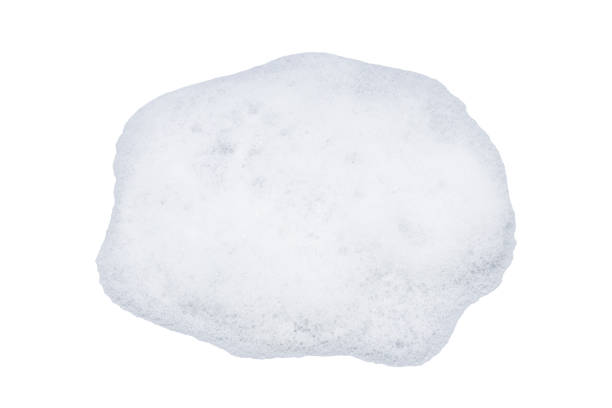istock foam isolated on white background. soap or detergent spume cut out 1306491784
