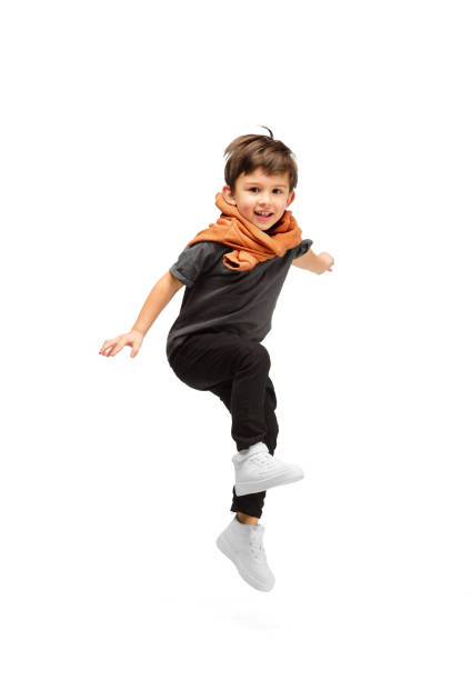 Happy caucasian little boy isolated on white studio background. Looks happy, cheerful, sincere. Copyspace. Childhood, education, emotions concept Jumping, running. Happy, smiley little caucasian boy isolated on white studio background with copyspace for ad. Looks happy, cheerful. Childhood, education, human emotions, facial expression concept. one little boy stock pictures, royalty-free photos & images