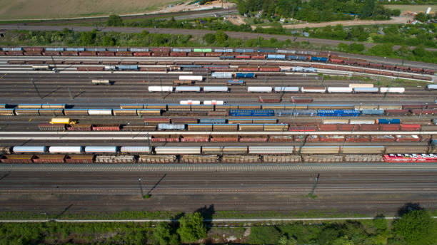 istock Railyard, shunting yard and freight trains - aerial view 1306491827