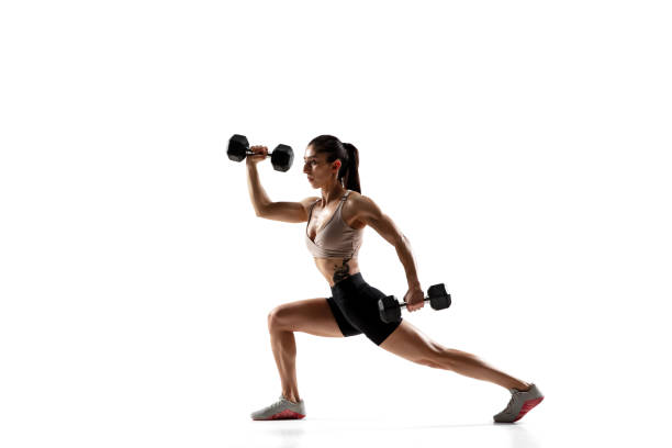 istock Caucasian professional female athlete training isolated on white studio background. Muscular, sportive woman. 1306492415