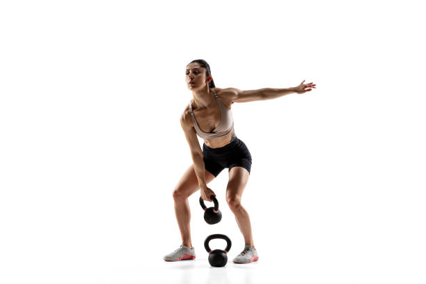 istock Caucasian professional female athlete training isolated on white studio background. Muscular, sportive woman. 1306492426