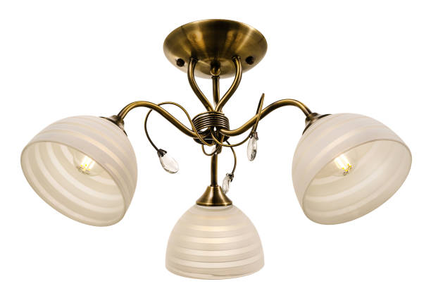 istock Bronze three-lamp ceiling lamp with matt bowl-shaped shades with a geometric pattern in the form of transverse stripes 1306493399