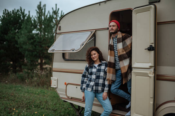 istock Romantic couple spending time together near trailer home 1306493607