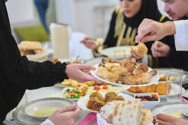 istock Muslim family having iftar together during Ramadan 1306494985