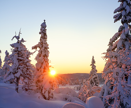 Mountain area called Synnfjell after heavy snowfall with warm morning sunlight