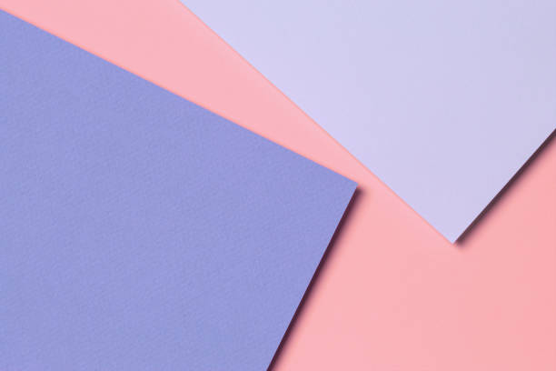 istock Abstract colored paper texture background. Minimal geometric shapes and lines in light blue, pastel pink, purple colors 1306498286