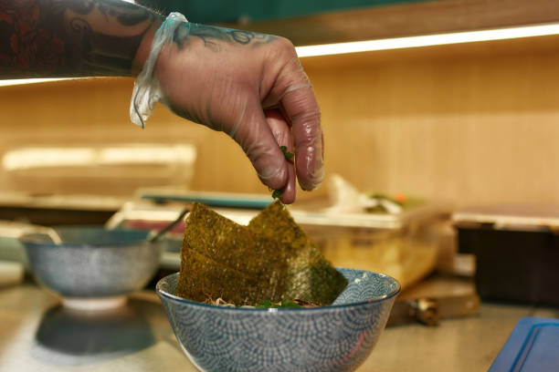 istock Chef preparing a dish in Asian cuisine 1306498966
