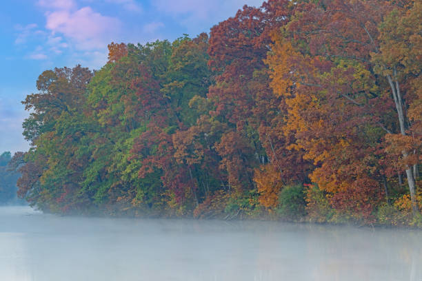 istock Autumn Dawn Eagle Lake in Fog 1306500002
